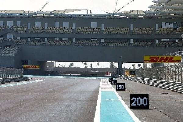 Formula One World Championship: Circuit detail and run off under West Grandstand