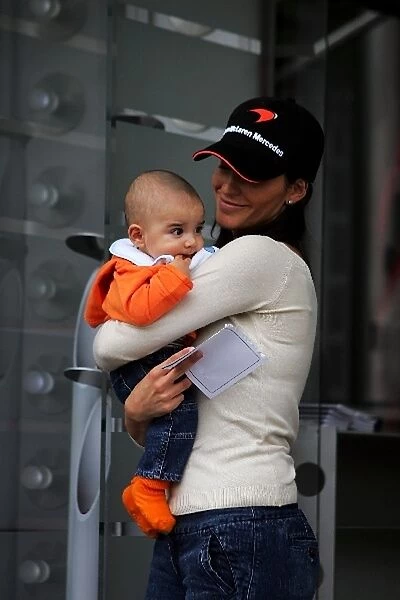 Formula One World Championship: Connie Montoya with baby son Sebastien