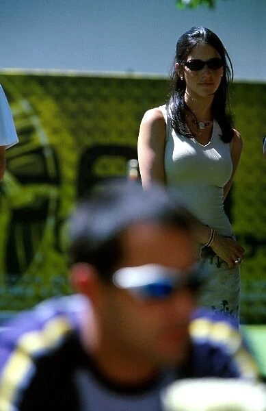 Formula One World Championship: Connie Montoya looks on at her husband Juan Pablo Montoya Williams