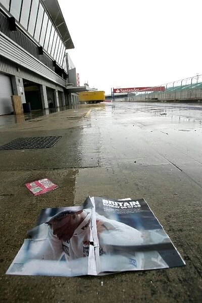 Formula One World Championship: A copy of the Red Bulletin is left in the pitlane