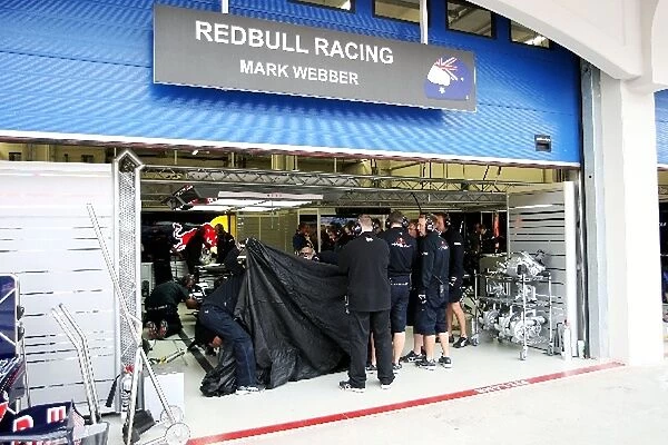 Formula One World Championship: The covered Red Bull Racing RB4 of Mark Webber Red Bull Racing