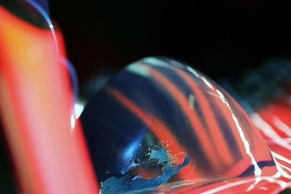 Formula One World Championship: Cracked paint on the livery of the Scuderia Toro Rosso STR02