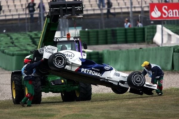 Formula One World Championship: The crashed BMW Sauber F1. 08 off Robert Kubica BMW Sauber F1 is towed away