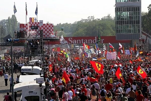 Formula One World Championship: The crowd invade the track as the podium commences