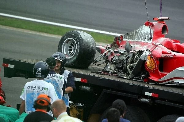 Formula One World Championship: The damaged car of Michael Schumacher Ferrari F2004 after a practice crash