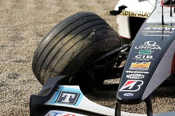 Formula One World Championship: The damaged car of Zsolt Baumgartner Minardi Cosworth PS04B after he collided with Giorgio Pantano Jordan Ford