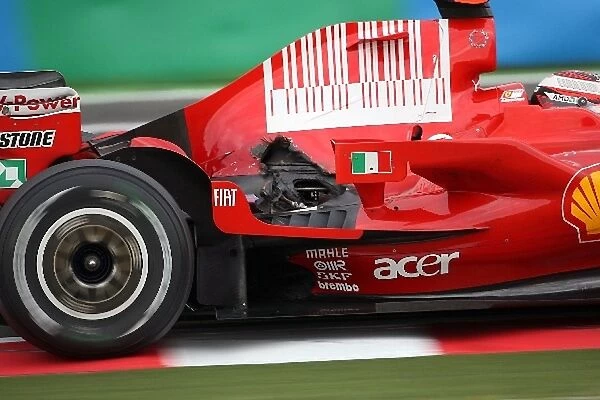 Formula One World Championship: Damaged exhaust on the car of Kimi Raikkonen Ferrari F2008