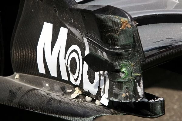 Formula One World Championship: The damaged McLaren Mercedes MP4  /  20 of Juan Pablo Montoya is returned to the pits after qualifying