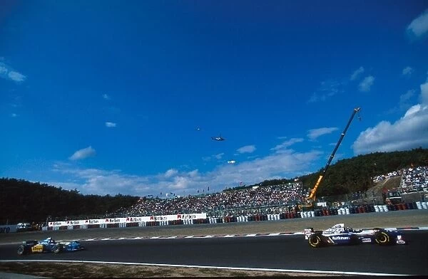 Formula One World Championship: David Coulthard Williams FW17 leads eventual winner Michael Schumacher