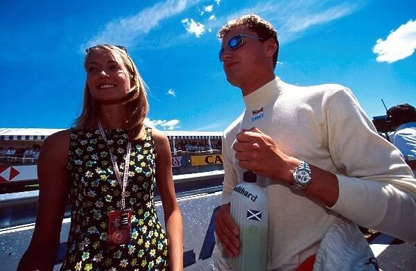 Formula One World Championship: David Coulthard, McLaren MP4-12 DNF and girlfriend Heidi Wichlinski