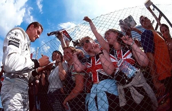 Formula One World Championship: David Coulthard Mclaren signs autographs