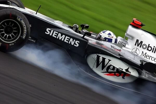 Formula One World Championship: David Coulthard McLaren Mercedes MP4  /  19B locks up