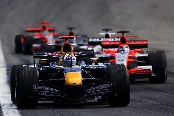 Formula One World Championship: David Coulthard Red Bull Racing RB2 ahead of Christijan Albers Spyker MF1 Racing M16