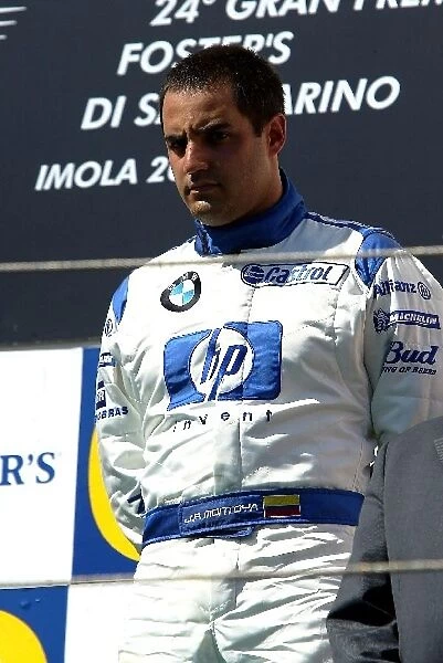 Formula One World Championship: A disappointed Juan Pablo Montoya Williams on the podium after the race
