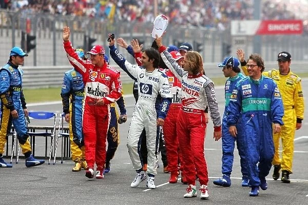 Formula One World Championship: The drivers leave the end of year photograph