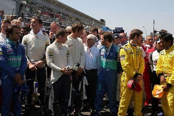 Formula One World Championship: The drivers line up for the minutes silence in respect of those killed or injured in the London Terror attacks