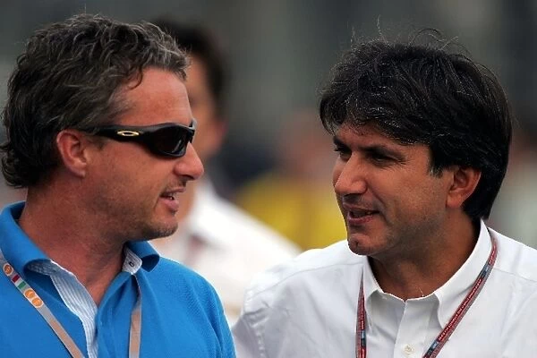 Formula One World Championship: Eddie Irvine Former F1 driver talks with Pasquale Lattuneddu of the FOM