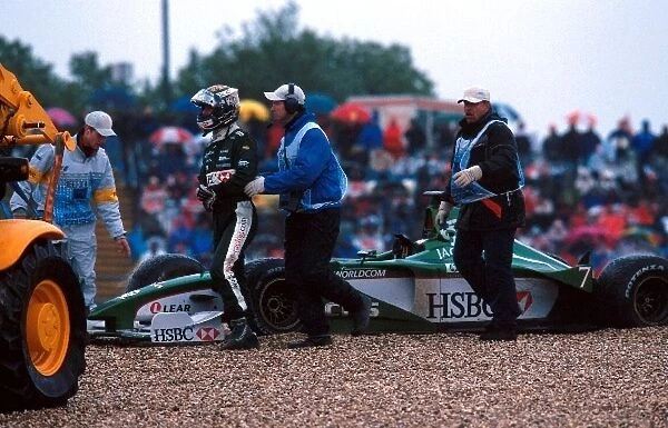 Formula One World Championship: Eddie Irvine Jaguar Cosworth R1 retires from the race