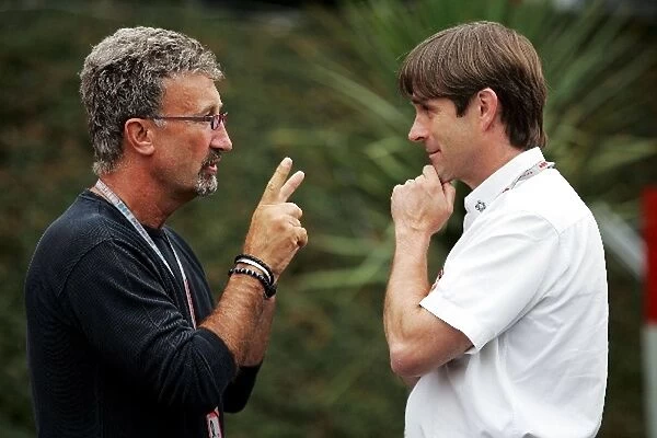 Formula One World Championship: Eddie Jordan Jordan Team Owner talks with Pascal Vasselon Michelin F1 Manager