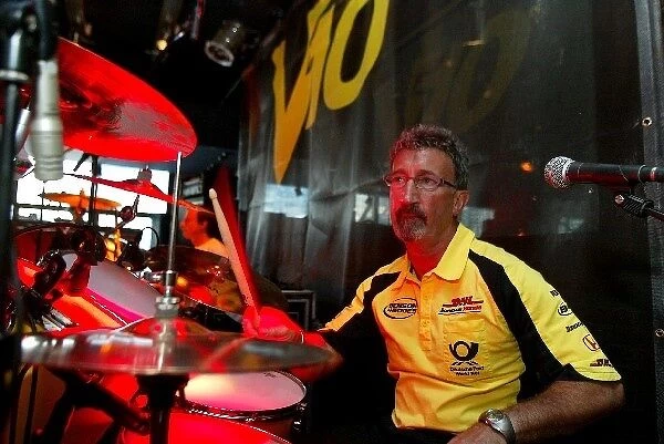 Formula One World Championship: Eddie Jordan plays the drums with his band, the V10 s