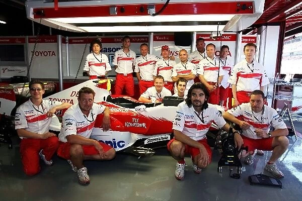 Formula One World Championship: The engineers of Ralf Schumacher Toyota with his Toyota TF107