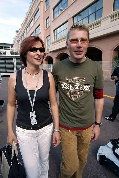 Formula One World Championship: Erja Hakkinen and her husband Mika Hakkinen in the paddock