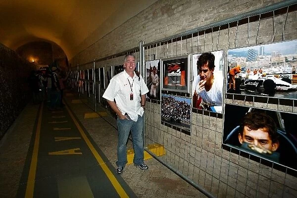 Formula One World Championship: F1 Photographer Keith Sutton with a collection of his pictures on display at an exhibition about Ayrton Senna