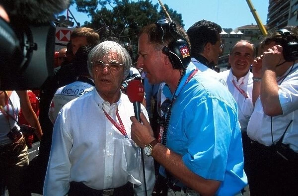 Formula One World Championship: F1 Supremo Bernie Ecclestone is interviewed on the grid by ITV Commentator Martin Brundle