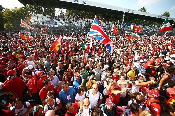 Formula One World Championship: Fans celebrates on the track after the race