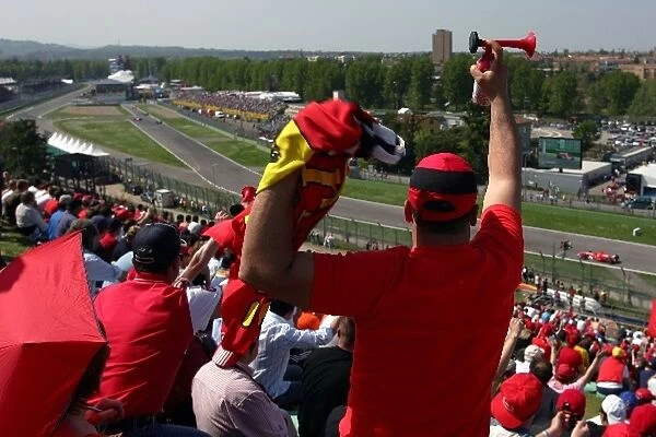 Formula One World Championship: Fans cheer for Michael Schumacher Ferrari 248 F1