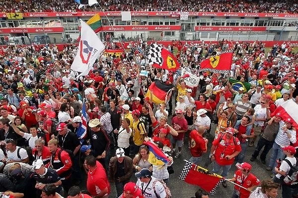 Formula One World Championship: Fans on the circuit at the end of the race