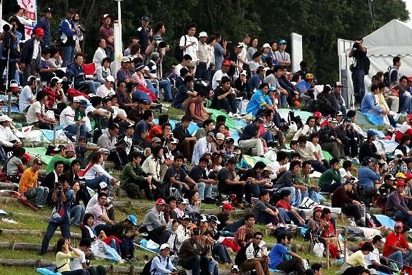 Formula One World Championship: Fans on the grass banks