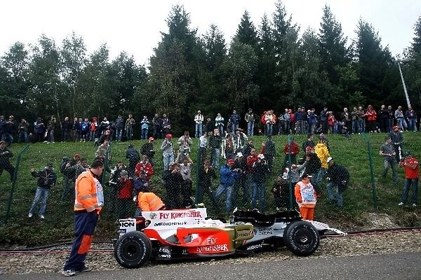 Formula One World Championship: Fans inspect the damaged car of Giancarlo Fisichella Force India F1 VJM01