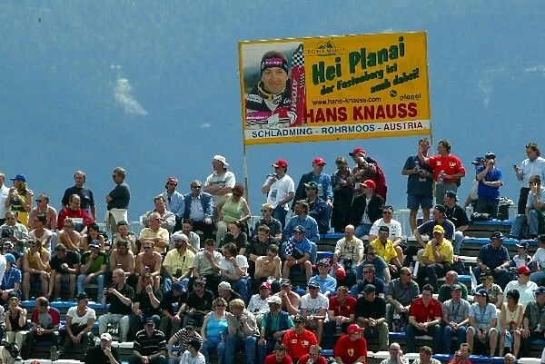 Formula One World Championship: Fans of skiing legend Hans Knauss in the less than crowded grandstands