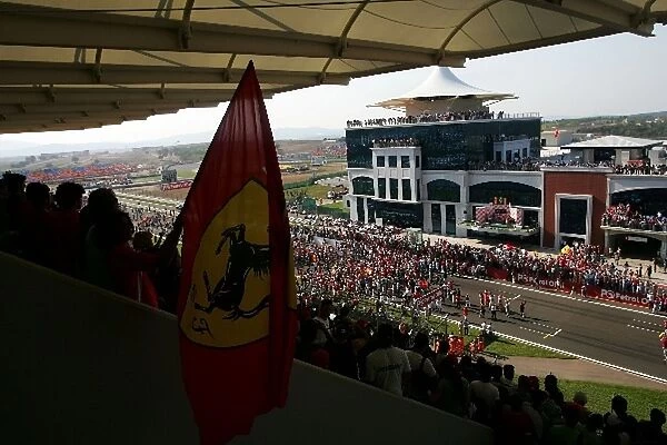 Formula One World Championship: Fans watch as the drivers are on the podium