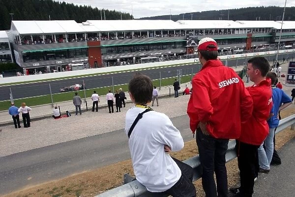 Formula One World Championship: Fans watch Fernando Alonso McLaren Mercedes MP4  /  22