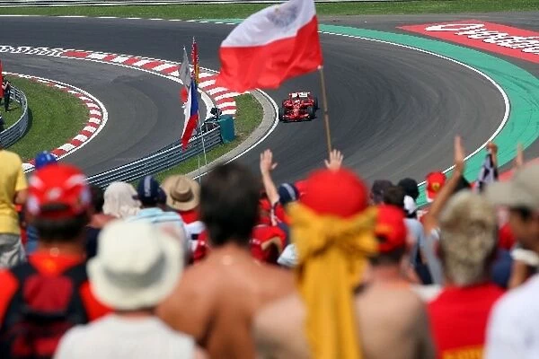 Formula One World Championship: Fans watch Kimi Raikkonen Ferrari F2008