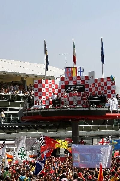Formula One World Championship: Fans watch the podium