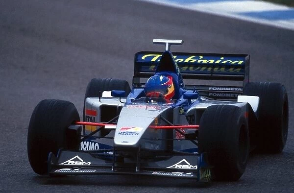 Formula One World Championship: Fernando Alonso, the 1999 Open Moviestar by Nissan Champion test drove the Minardi M101