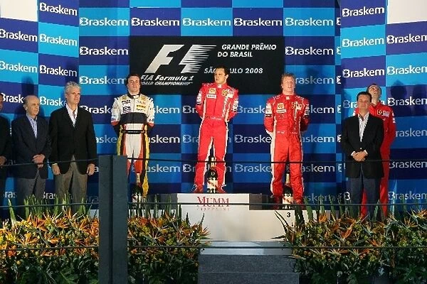 Formula One World Championship: Fernando Alonso Renault, Felipe Massa Ferrari and Kimi Raikkonen Ferrari on the podium
