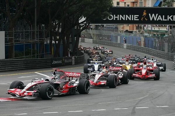 Formula One World Championship: Fernando Alonso McLaren Mercedes MP4-22 leads the field at the start
