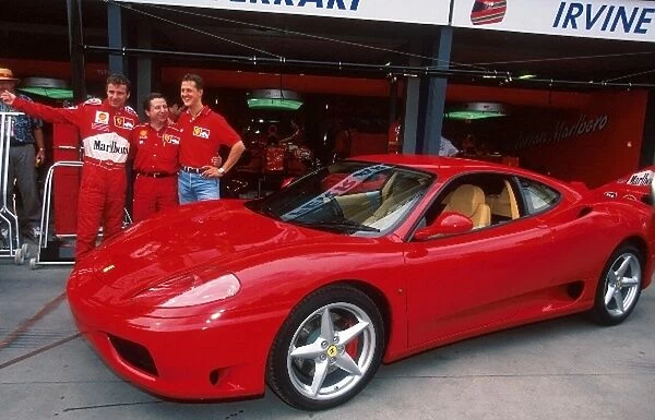Formula One World Championship: The Ferrari 360 with Irvine, Todt and Schumacher behind