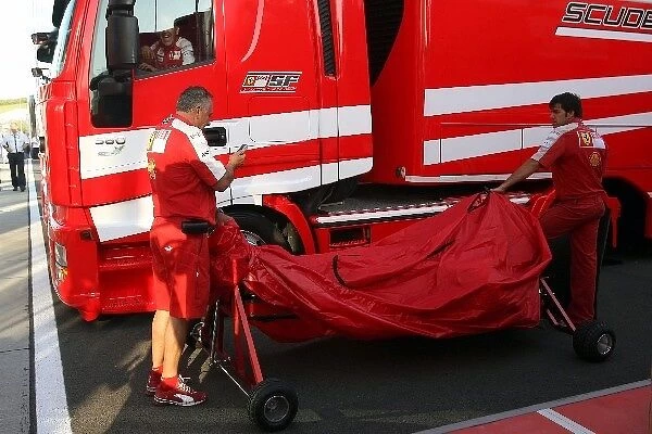 Formula One World Championship: Ferrari bring a new Ferrari F2009 tub into the paddock