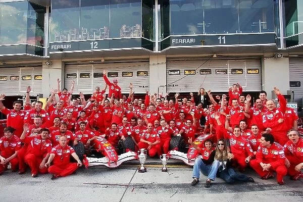 Formula One World Championship: Ferrari celebrates first and third positions for Michael Schumacher Ferrari and team mate Felipe Massa Ferrari