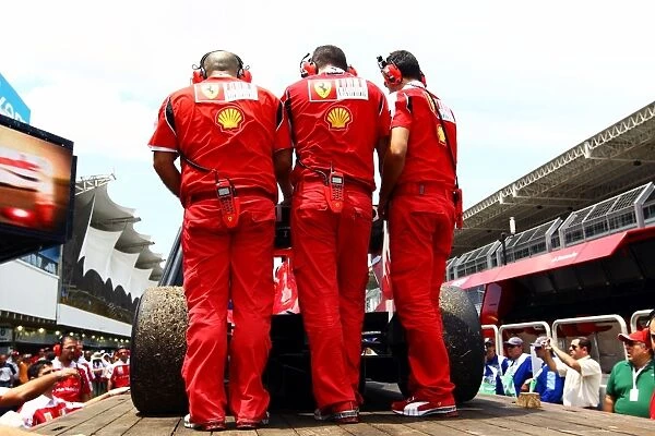 Formula One World Championship: The Ferrari F10 of Fernando Alonso Ferrari is returned to the pits on a truck