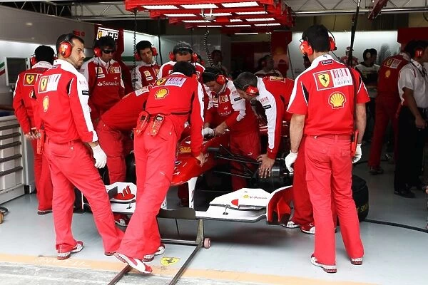Formula One World Championship: Ferrari F10 in the pits