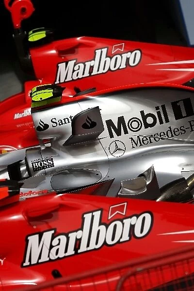 Formula One World Championship: The Ferrari F2007s of Felipe Massa Ferrari and Kimi Raikkonen Ferrari with the McLaren Mercedes MP4  /  22 of Lewis