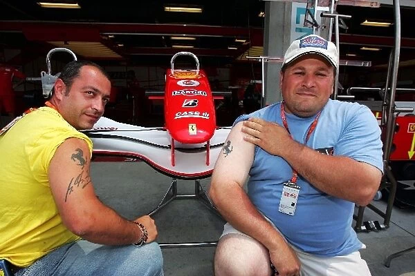 Formula One World Championship: Ferrari fans with tattoos