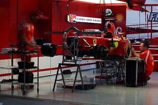 Formula One World Championship: The Ferrari garage at night