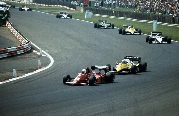 Formula One World Championship: The Ferrari of Rene Arnoux under pressure from Alain Prosts Renault